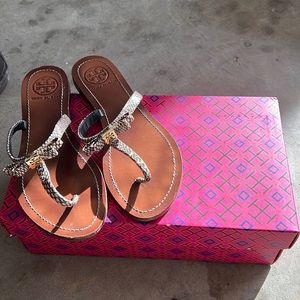 Lightly worn Tory Burch flat thong sandals in snakeskin, size 7